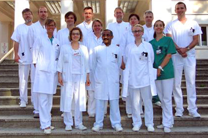 Gruppe Ärzte der Urologie in weißen Kitteln